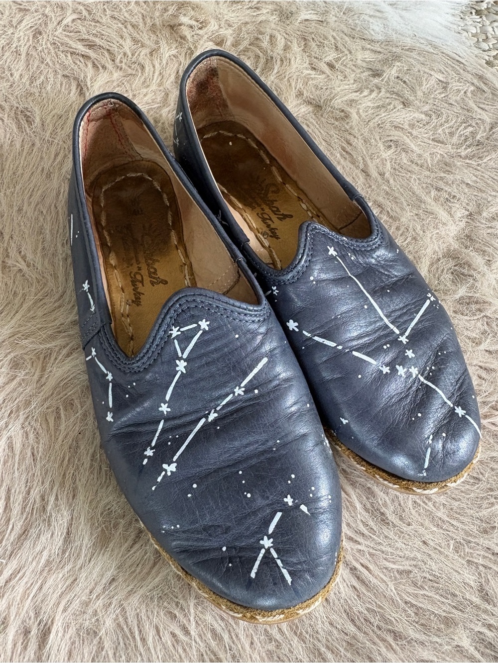 Sabah Navy Leather Women's Slip-On Flats with White Constellation Accents.